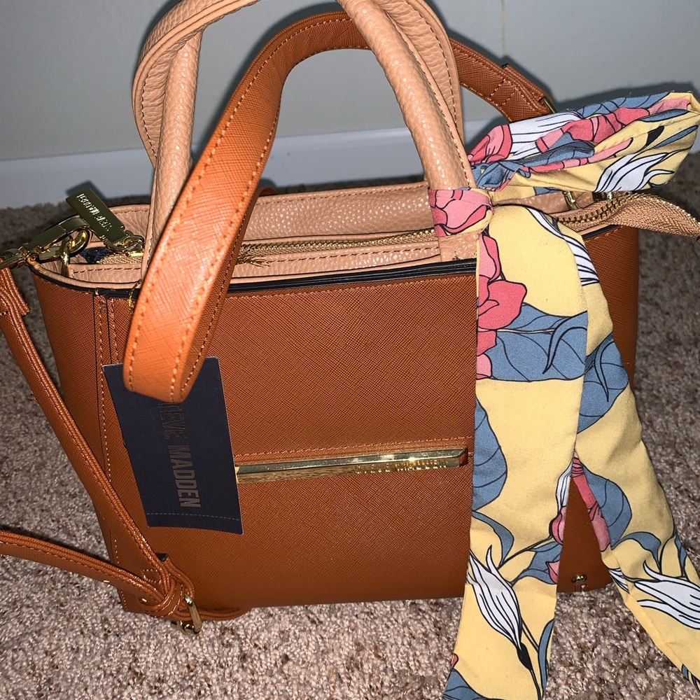 Steve Madden  mini Juno, tan in color